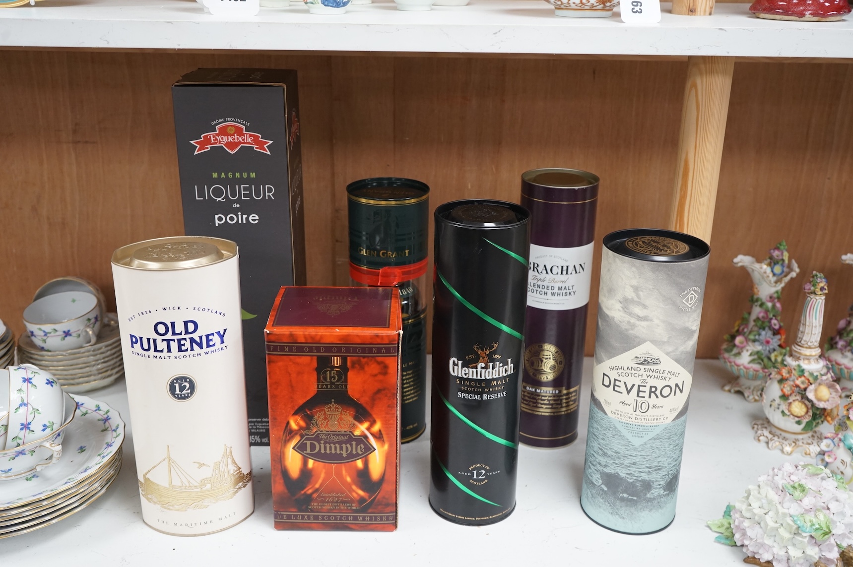 Six bottles of whisky to include Liqueur de Poire, Glenfiddich and Dimple